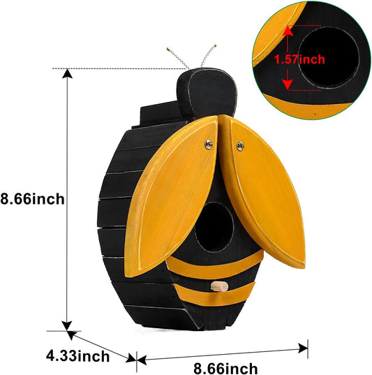 Bee-shaped wooden birdhouse with open yellow wings and circular entrance hole