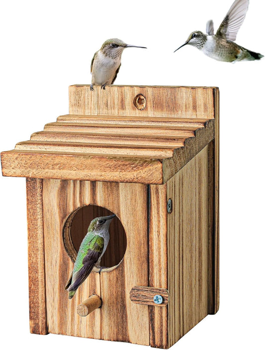 Wooden outdoor bird nesting house with circular entrance and side perch, pine finish.