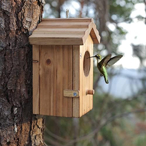 Wood mini hanging hummingbird house with circular entrance, side latch, slanted roof.