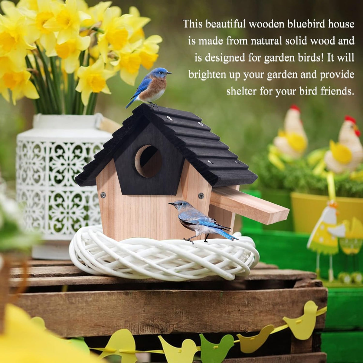 Wooden birdhouse with black roof, round entrance hole, and perched bluebirds